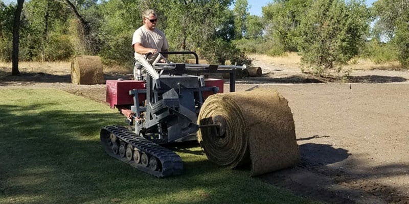 Machine being used for sod installation