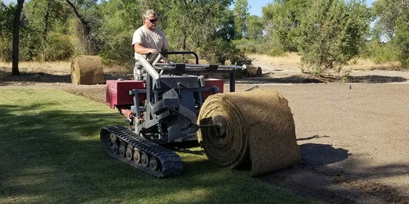 Machine being used for sod installation Machine being used for sod installation